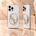 Natural Howlite Mineral Phone Grip with Gold-Tone Edge — two aligned phone views
