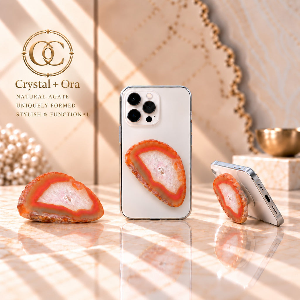 Orange agate adhesive phone grip with vivid orange bands and a pale pink-white center