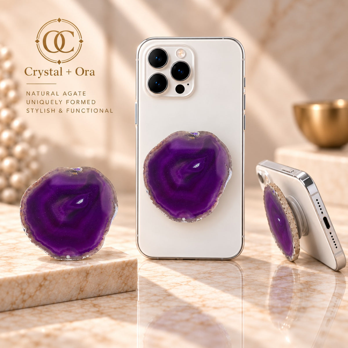 Violet agate adhesive phone grip with layered purple bands on white phones